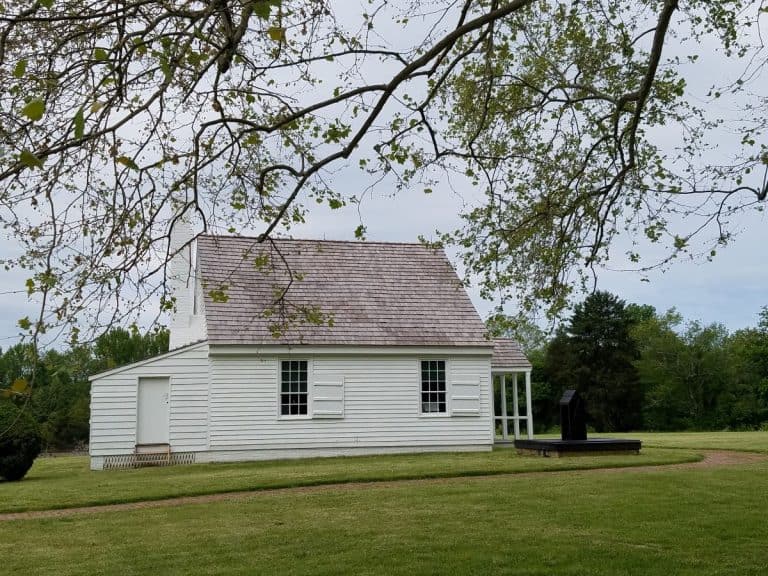 The Stonewall Jackson Death Site, once called the Stonewall Jackson Shrine, is a small white outbuilding, with two windows.