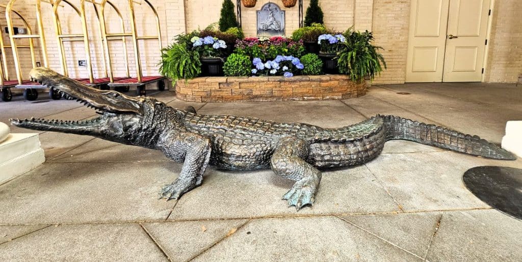 The history of the Jefferson Hotel in Richmond va includes having alligators in the pools. This iron alligator stands outside the lobby as reminder.