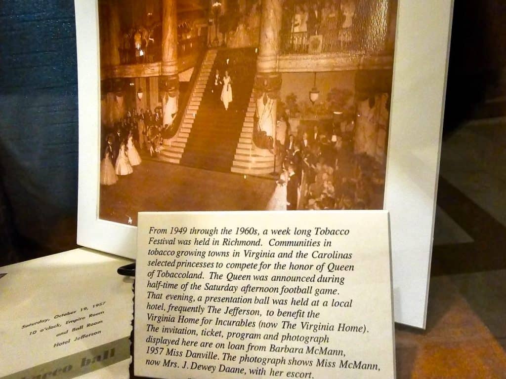An example of the exhibit that shows the history of the Jefferson Hotel in Richmond is a picture of a clipping from the Tobacco Ball that was once held in the hotel.