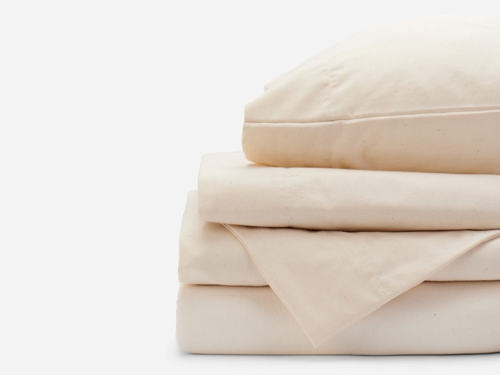 A pile sheets from Red Land Cotton folded up.