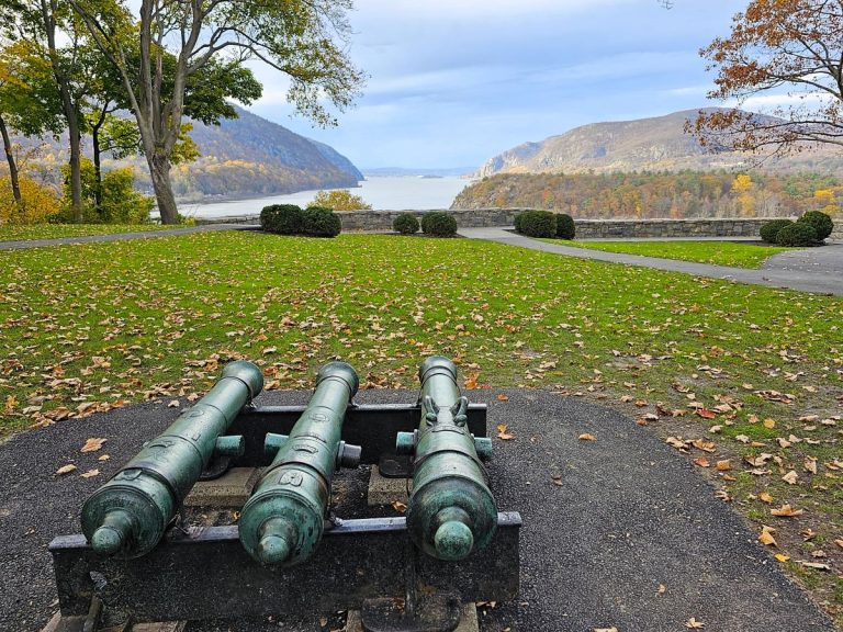 Three cannon face toward the Hudson River at West Point Military Academy.
